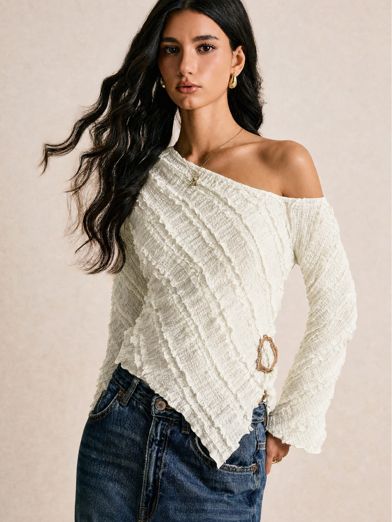 French textured one-shoulder long-sleeve top with asymmetrical hem