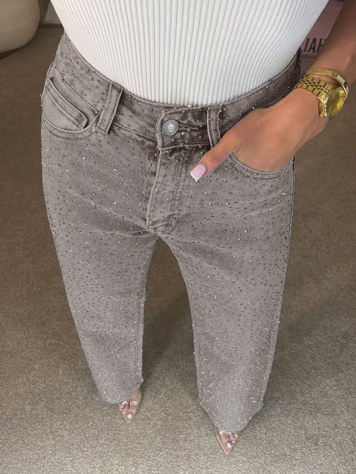 High-waist straight-leg washed jeans with rhinestone details