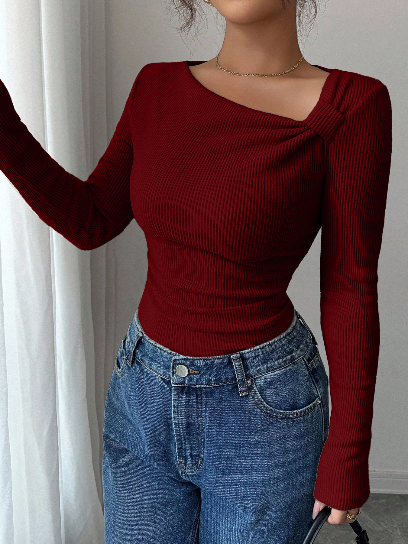 Slanted-neck knit top