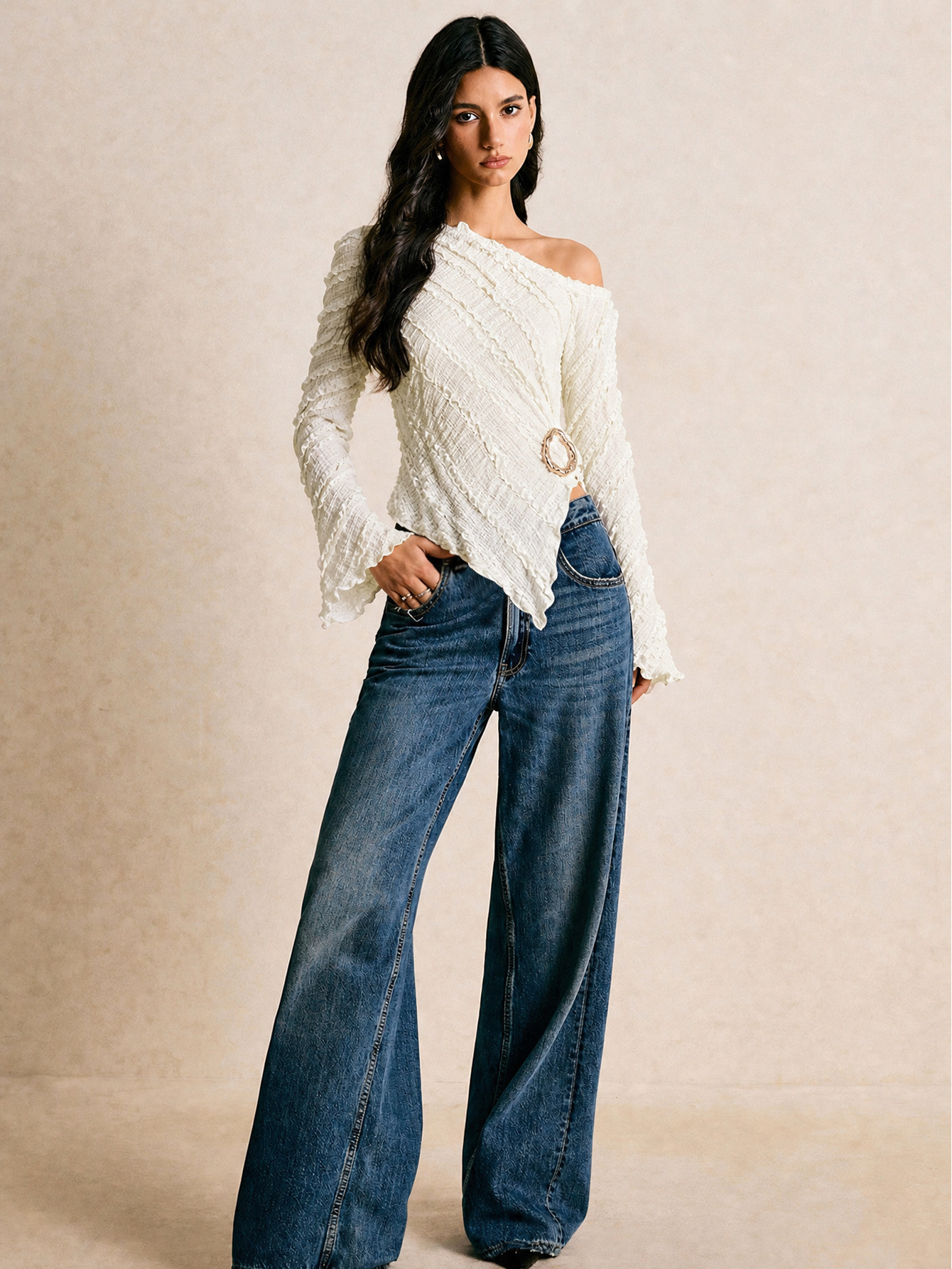 French textured one-shoulder long-sleeve top with asymmetrical hem