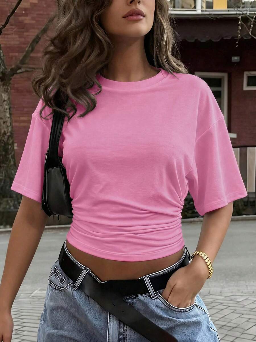 Solid color crew neck smocked short sleeve top, waist-cinching and slimming
