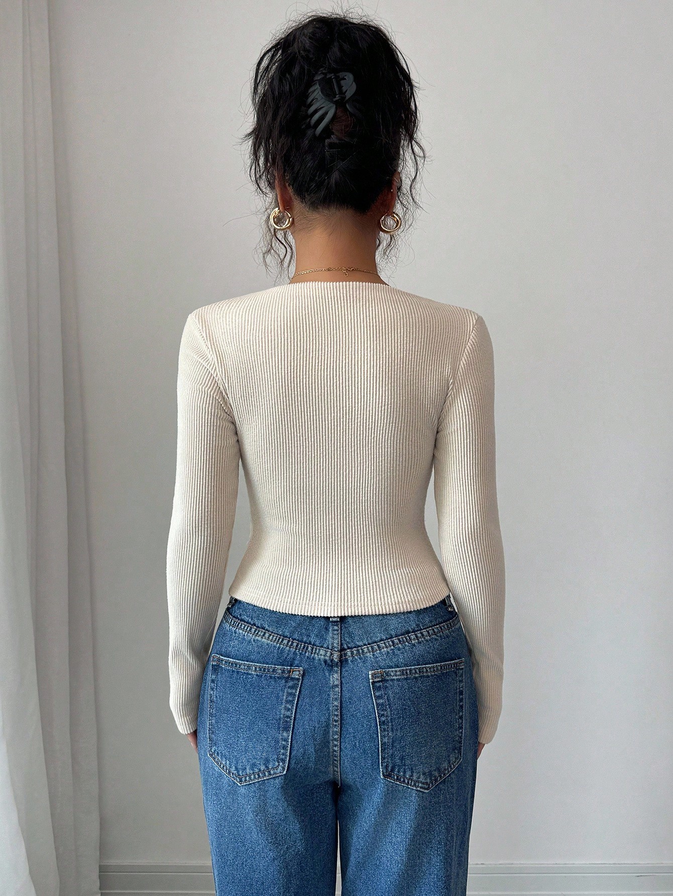 Slanted-neck knit top