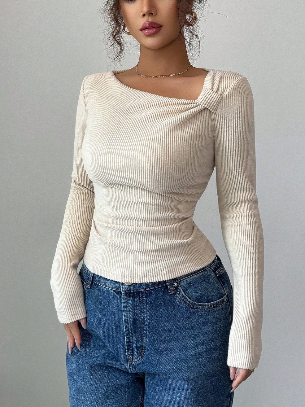 Slanted-neck knit top