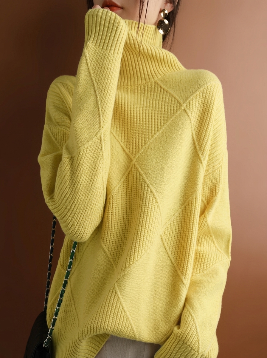 Solid color pullover sweater with diamond pattern and smooth texture