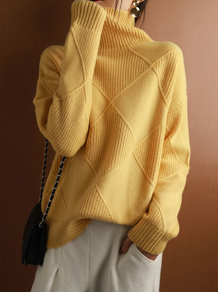 Solid color pullover sweater with diamond pattern and smooth texture