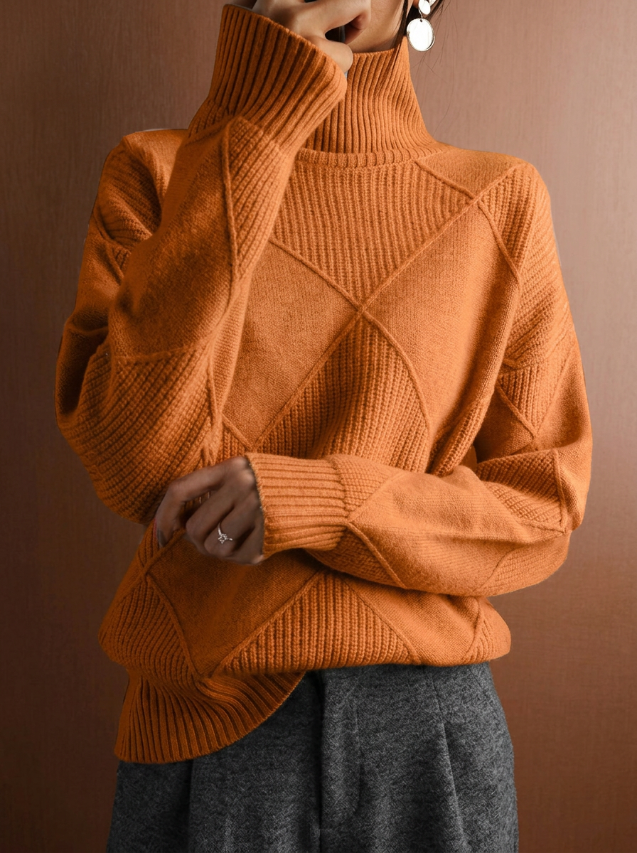 Solid color pullover sweater with diamond pattern and smooth texture