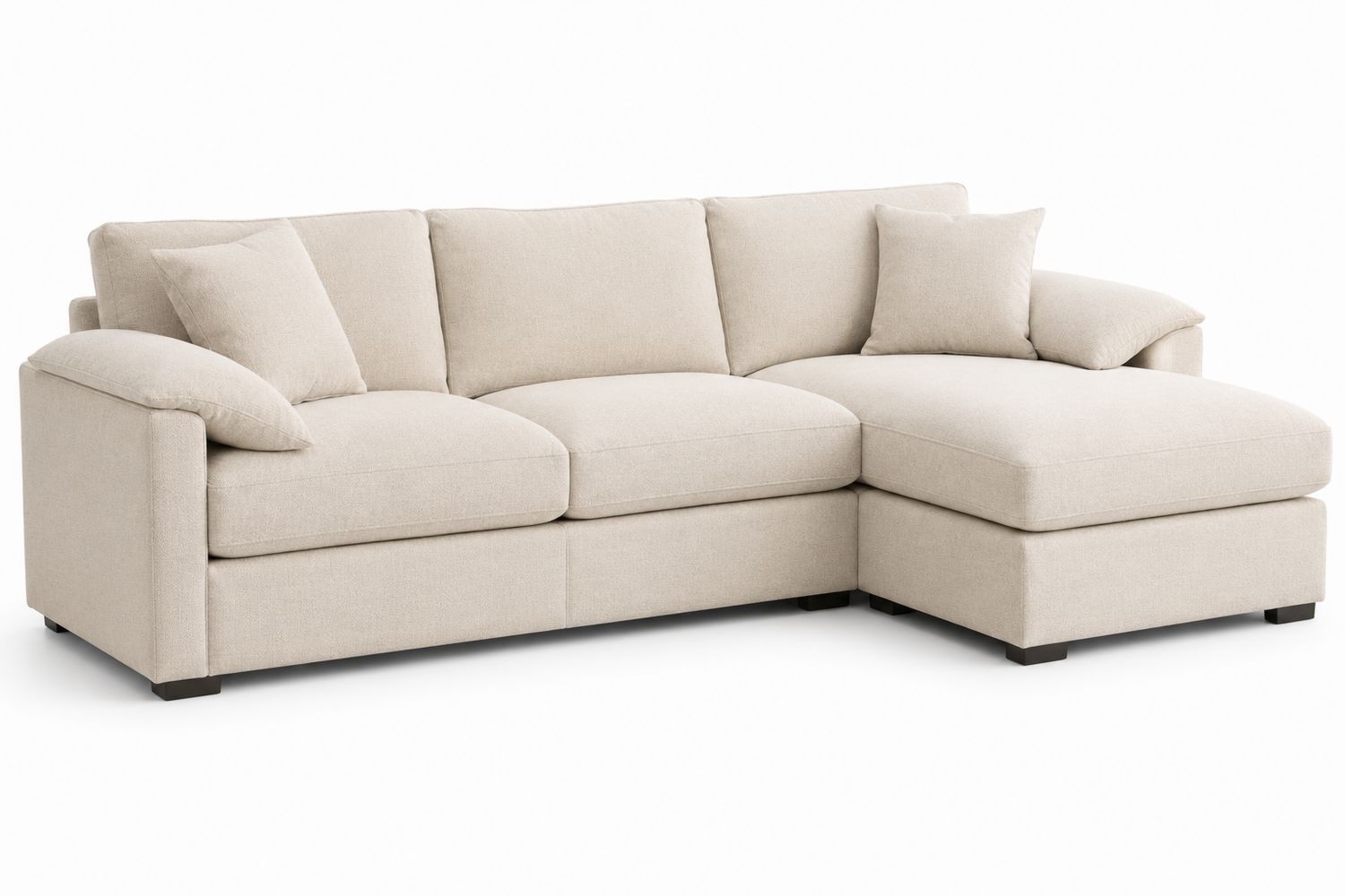 Sofá chaise longue de tela beige con cojines