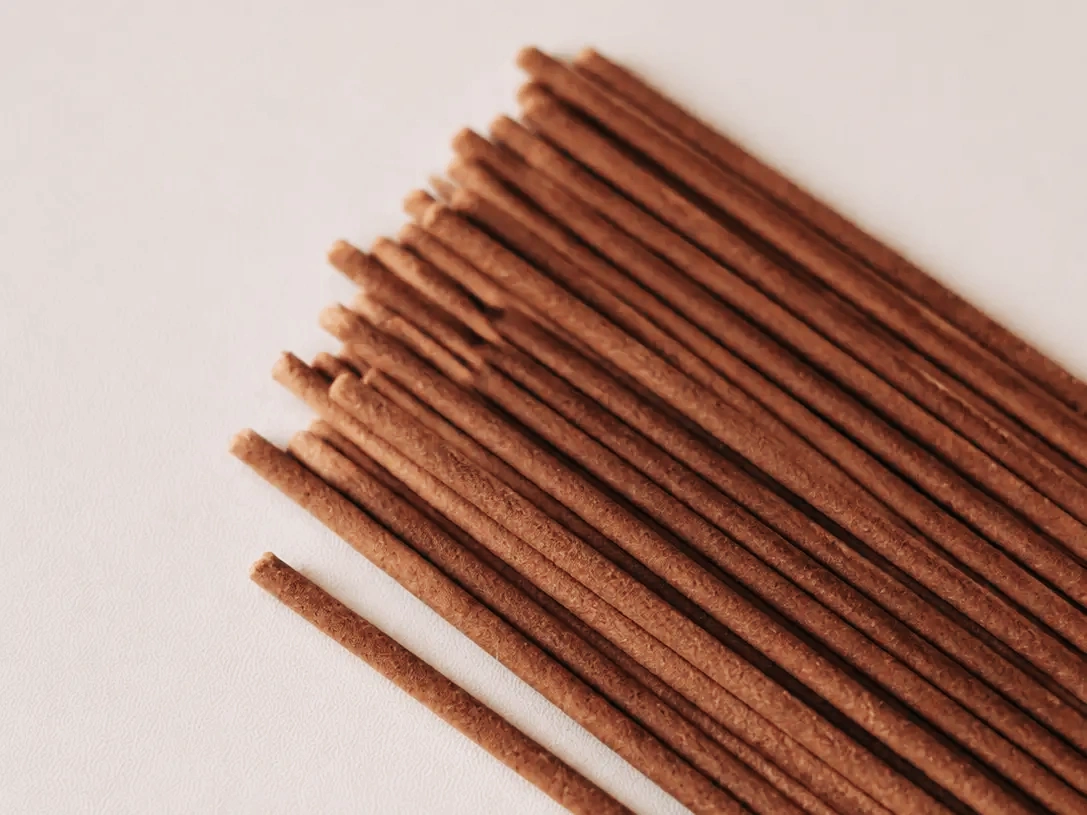 Close-up of the textured ends of brown Jid Sung 32.1 incense sticks