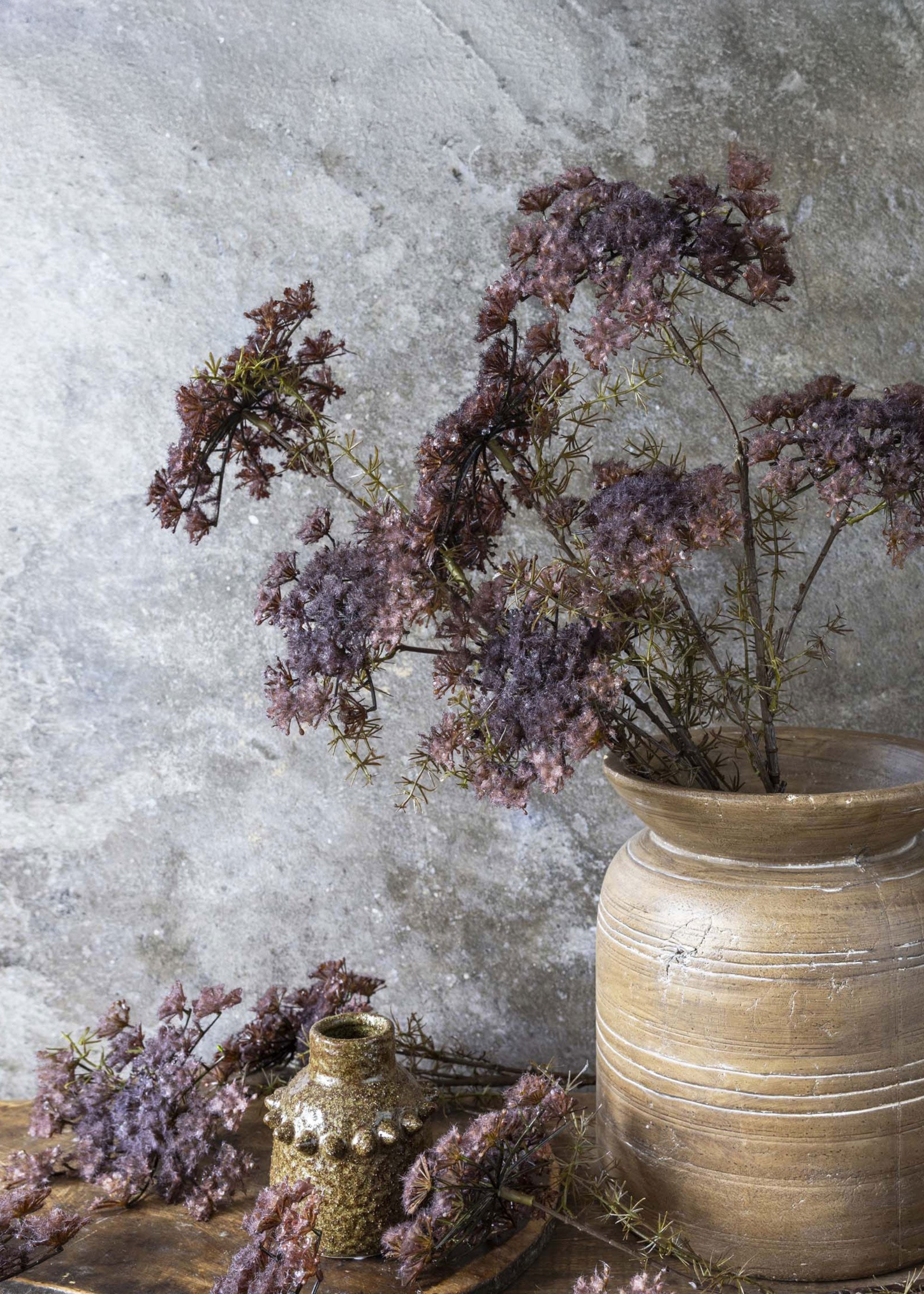 arrangement of faux purple queen anne's lace flowers