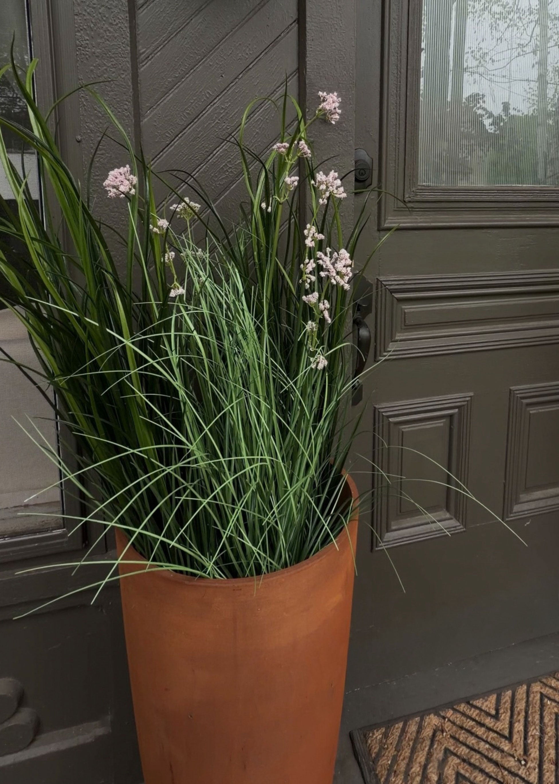 Milkweed Grass Potted Plant with Mauve Fake Flowers