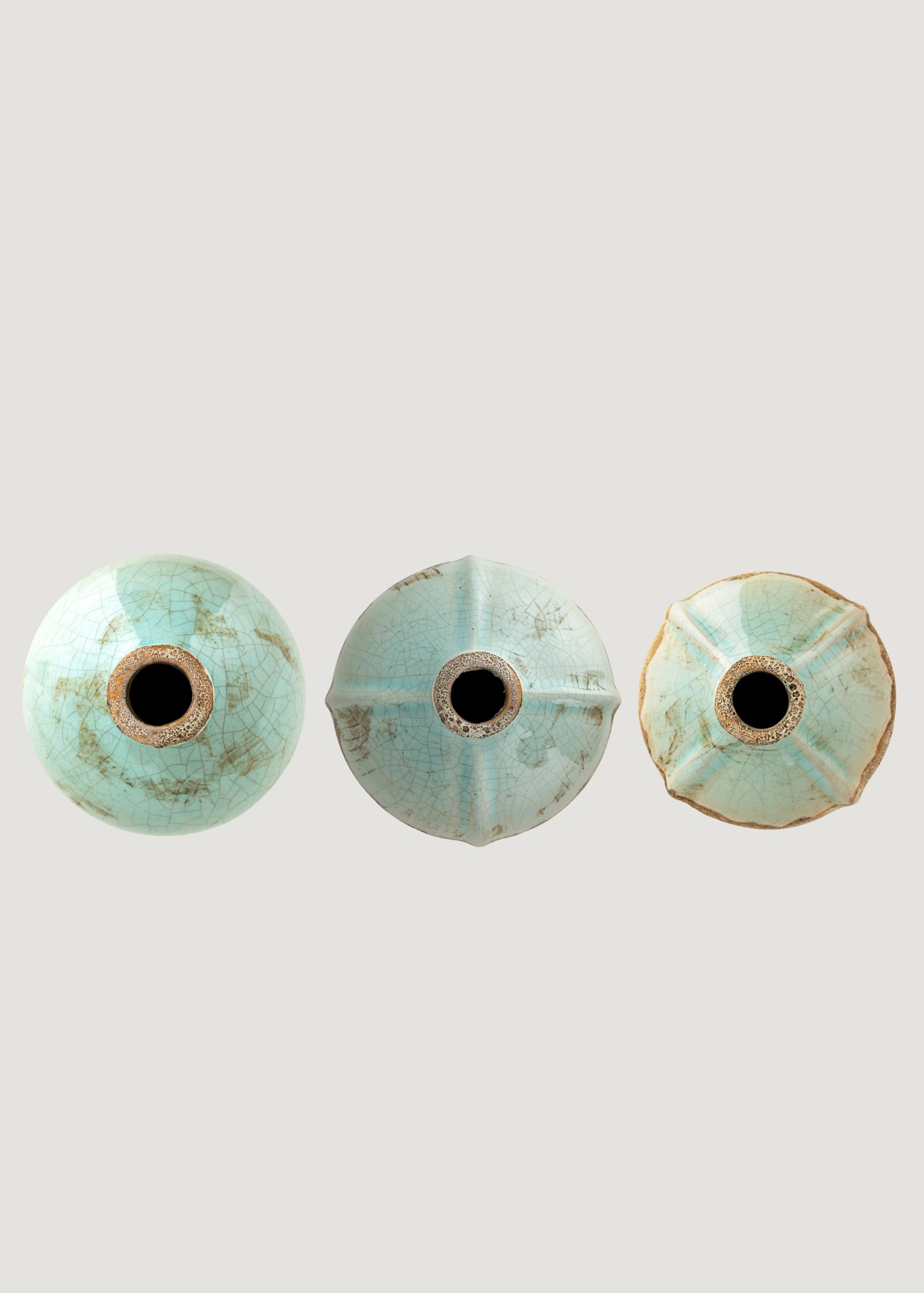 The openings of the Terra Cotta Bud Vases