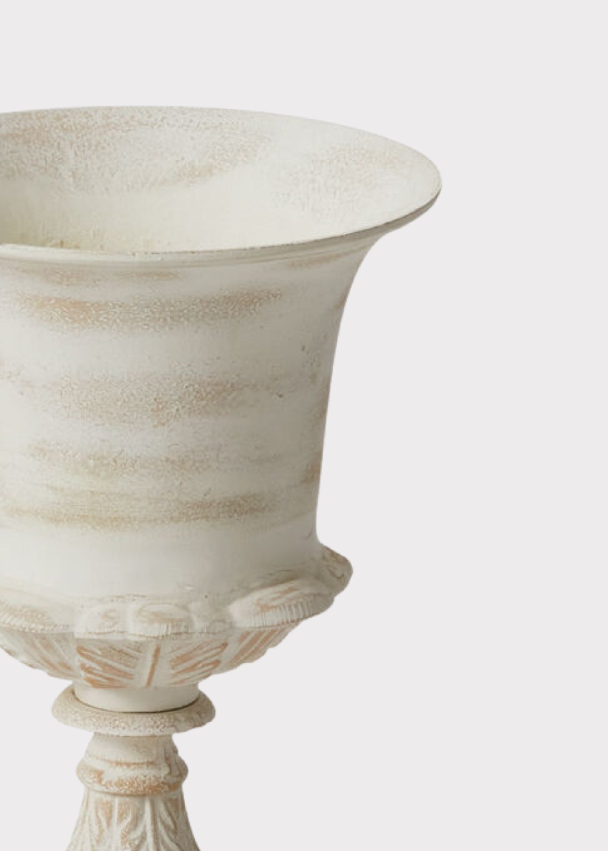 Close-up of a Distressed Metal Urn