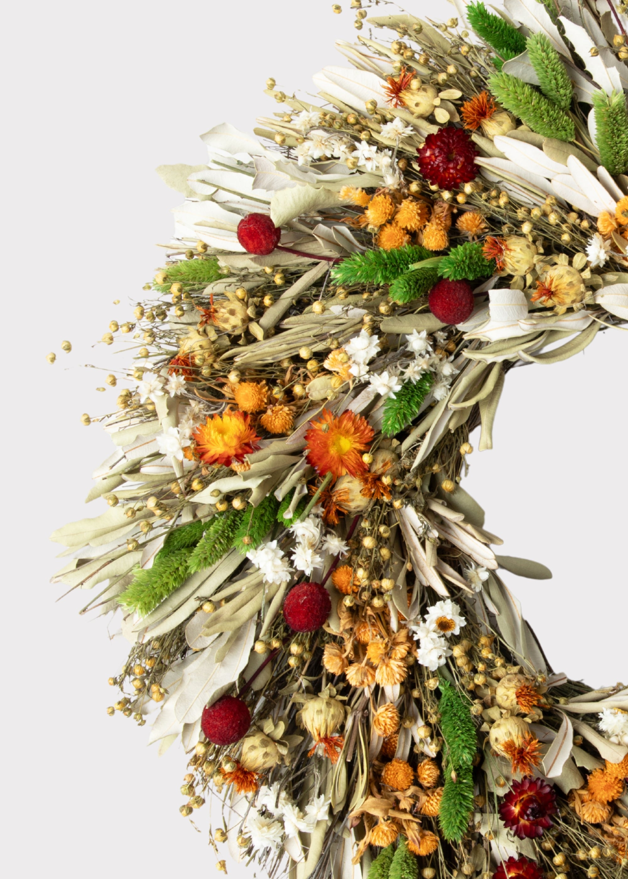 Close-up of Green and Orange Mixed Flowers Wreath