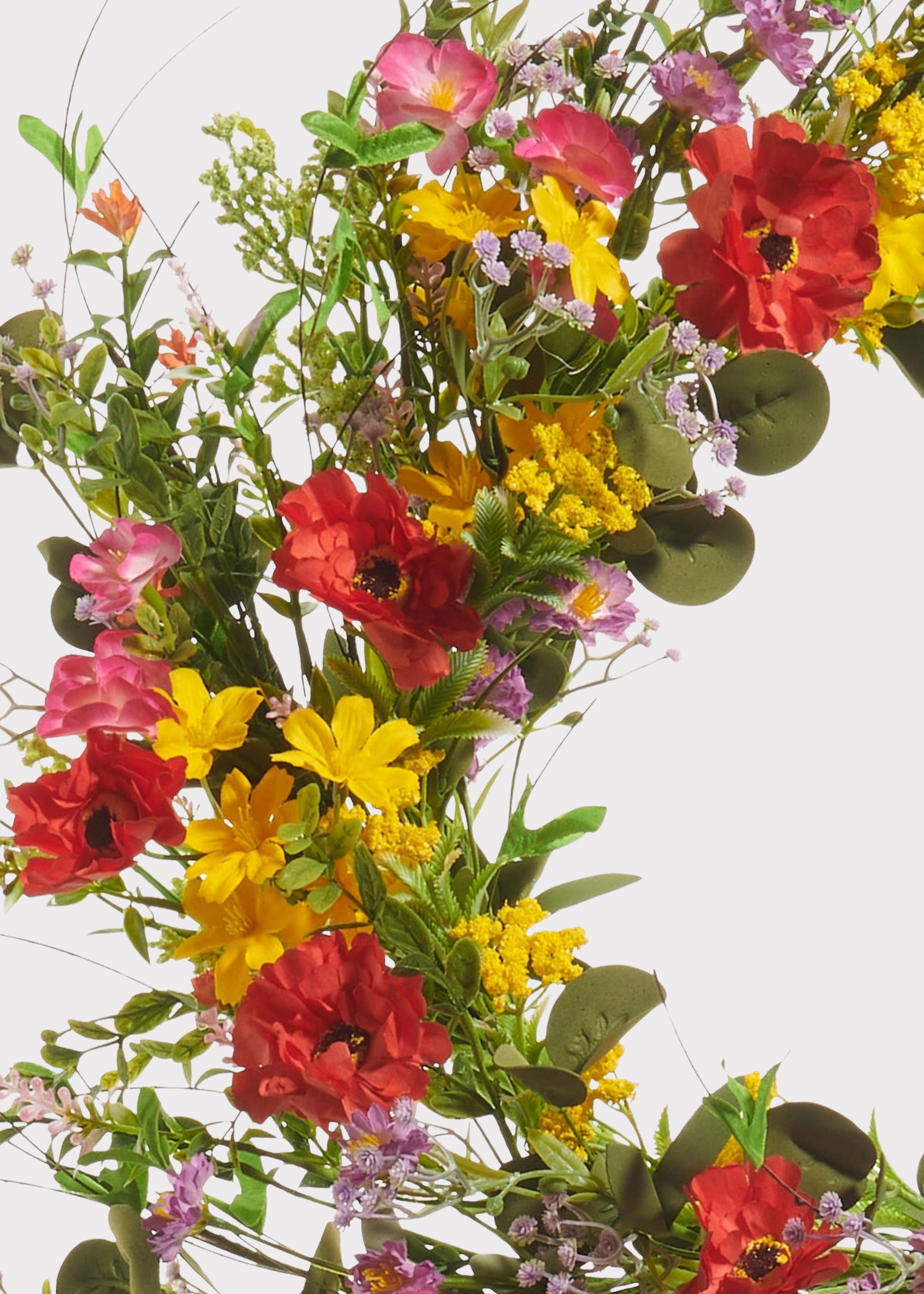 Close-up of poppy and blossom wreath