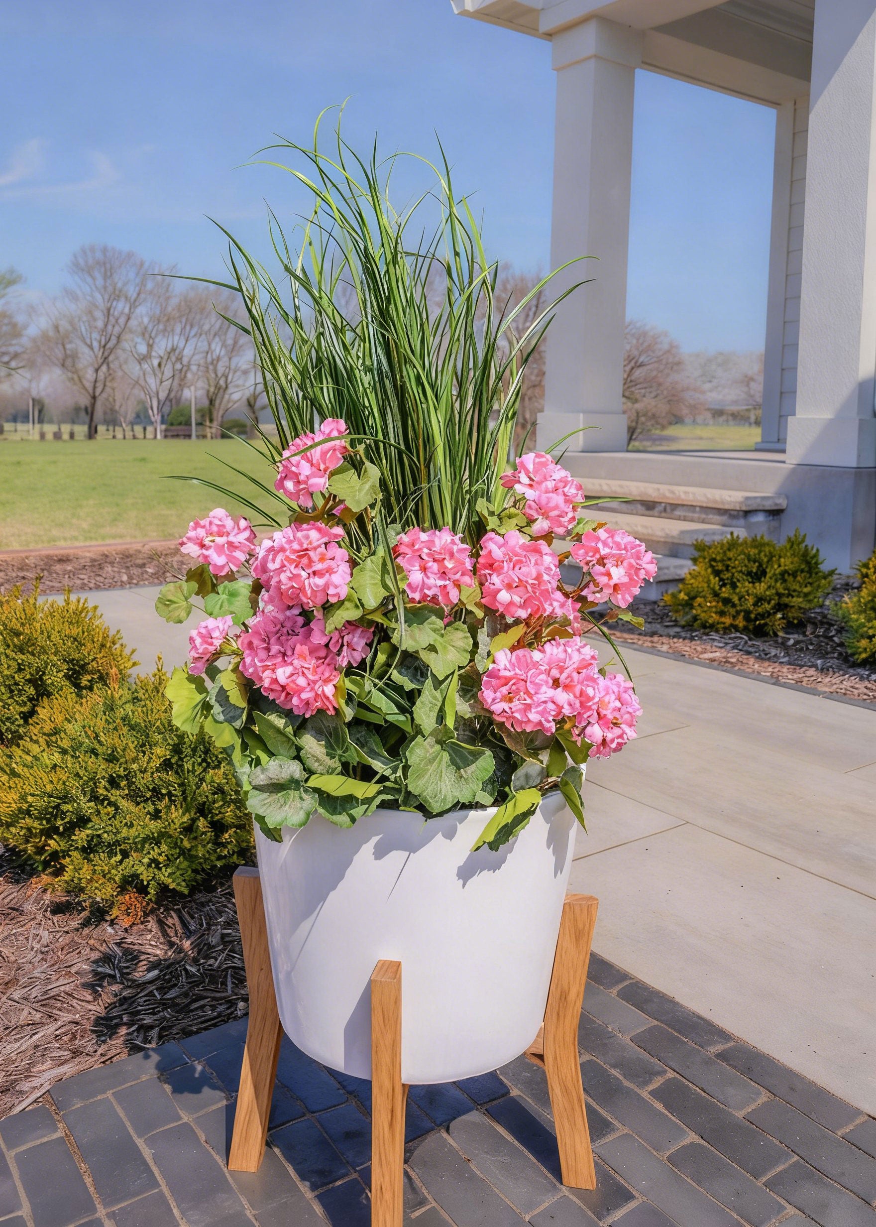 Pink Geraniums and Grass Bush Outdoor Flower Planter