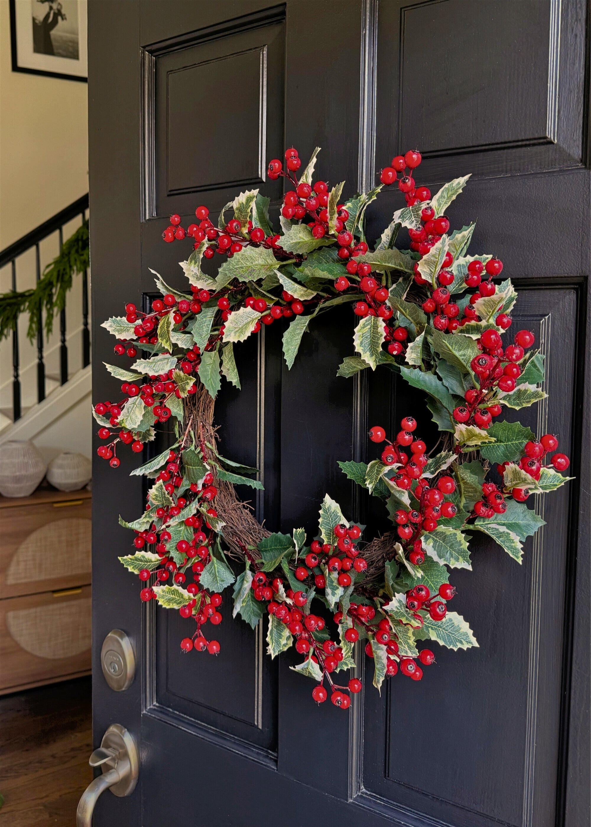 Traditional Holly and Berry Wreath on Black Front Door