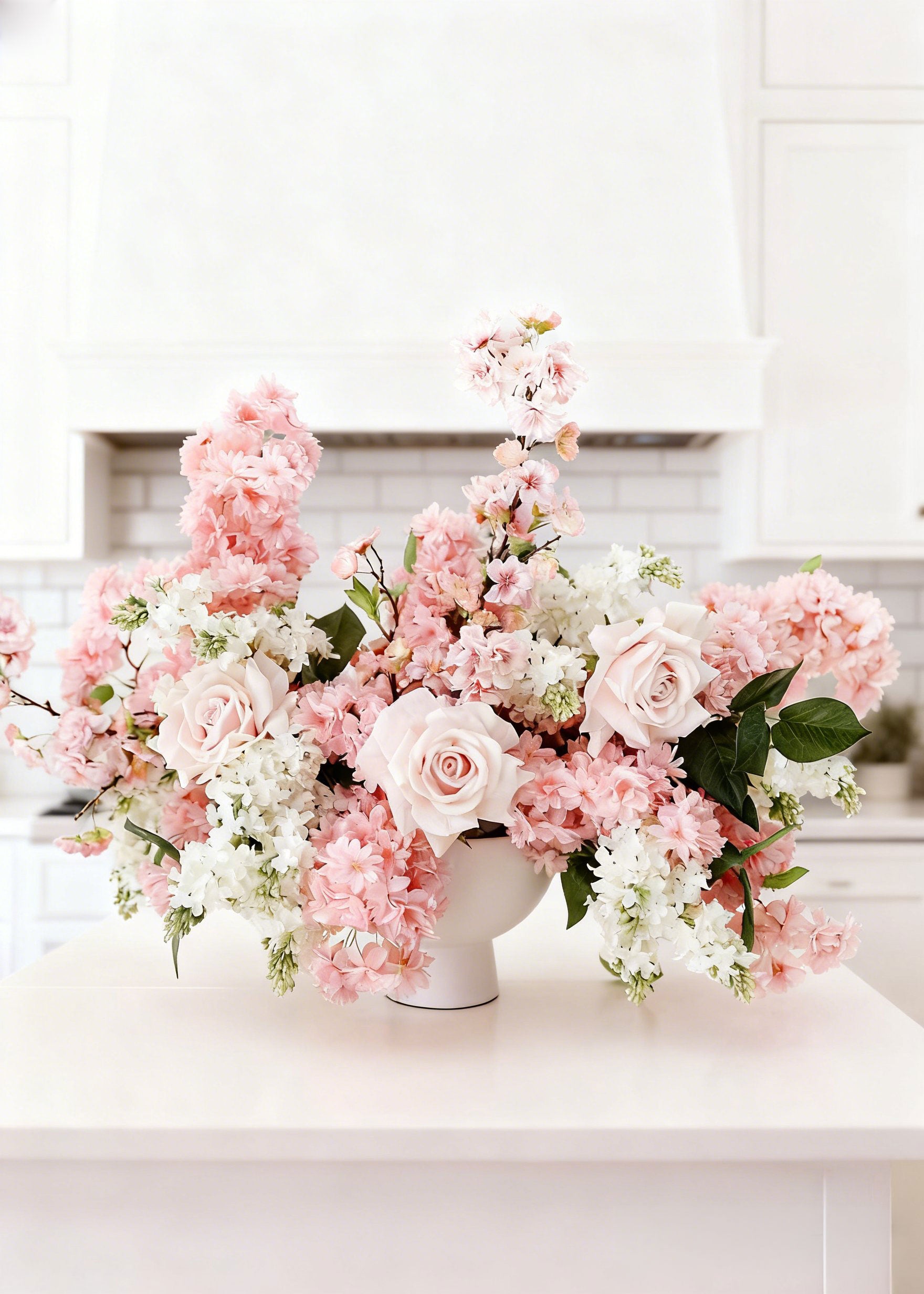rose and cherry blossom flower arrangement