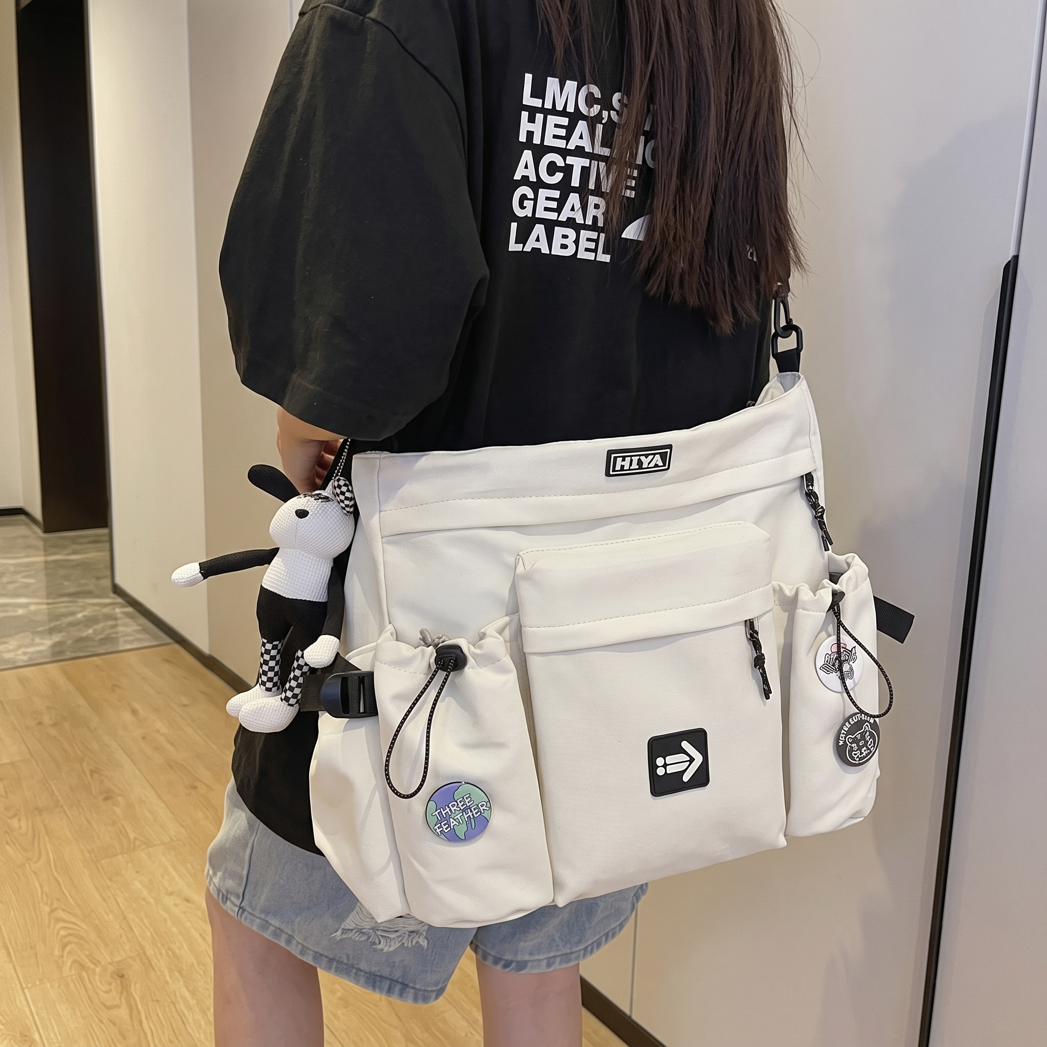 Minimalist, lightweight, versatile, and spacious crossbody bag.