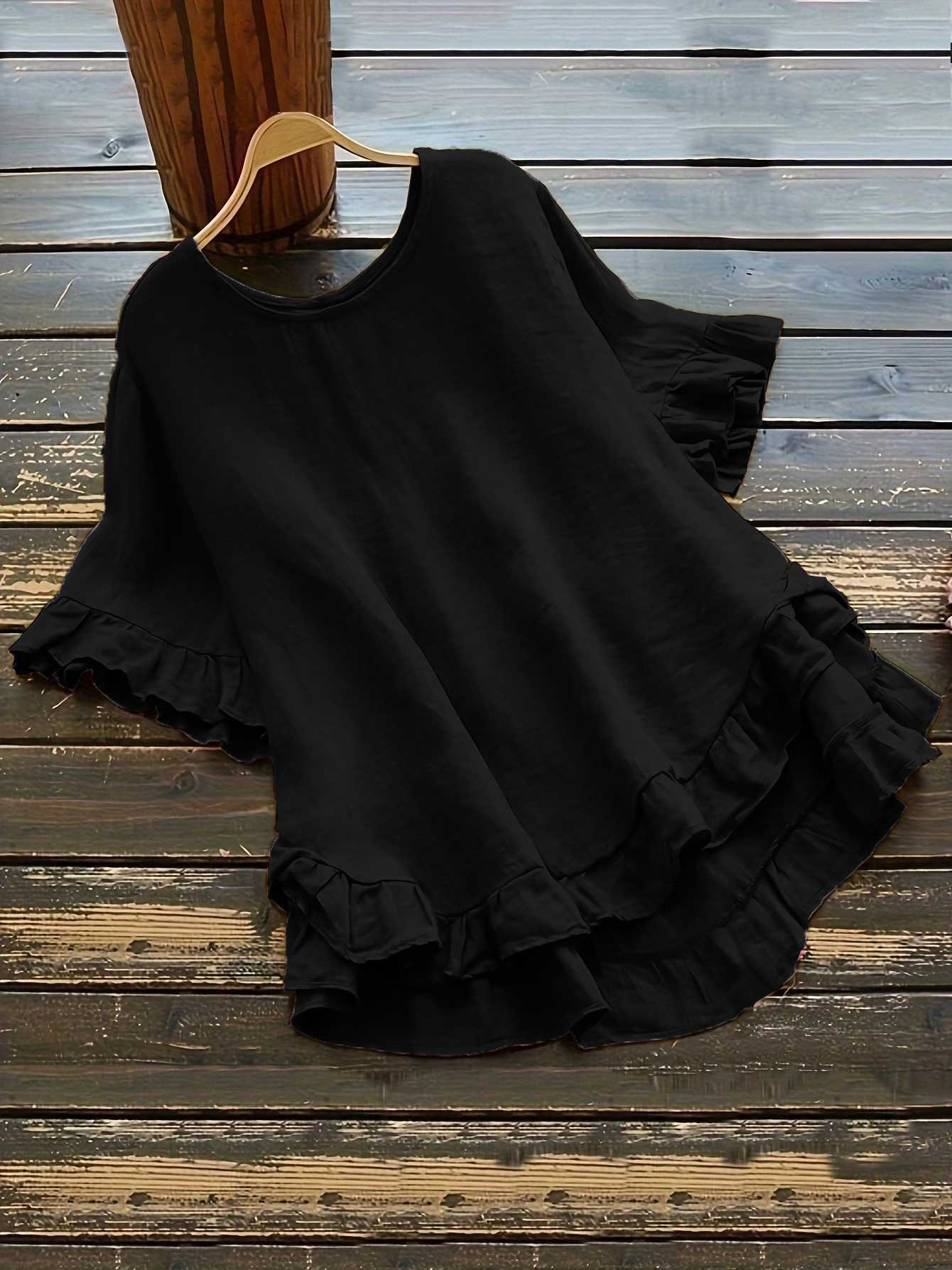 Buttonless ice silk ruffled hem top with front short and back long design, bell sleeves, and round neck