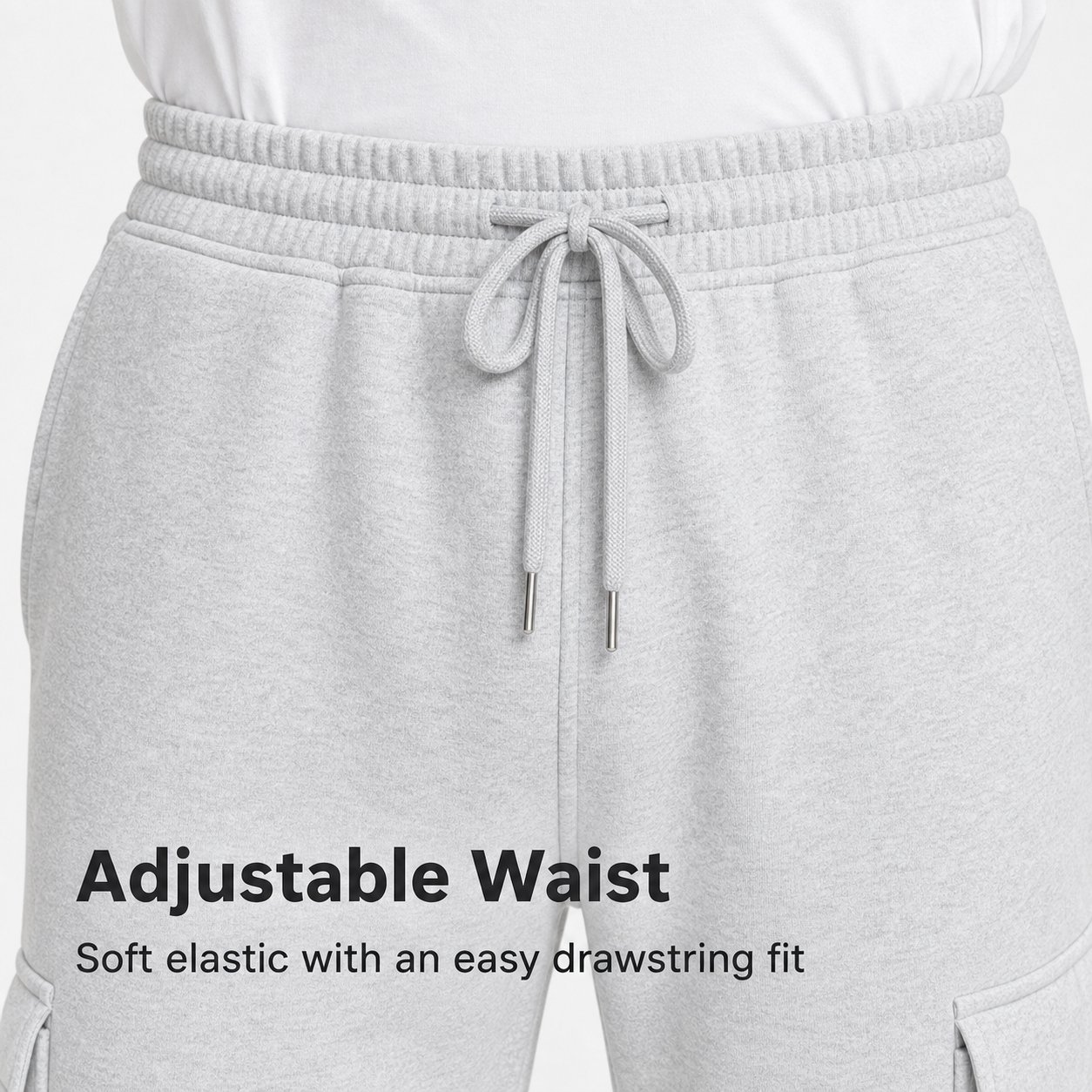 Adjustable drawstring waistband detail on fleece cargo sweatpants
