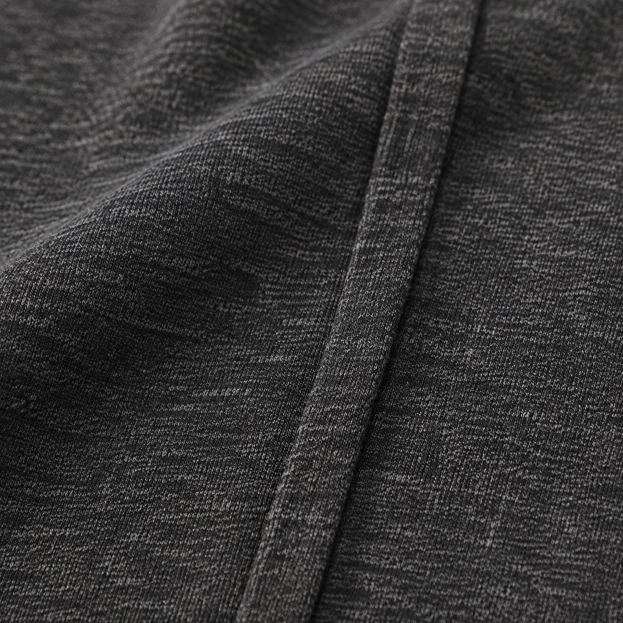 Fine matte heather-knit fabric texture detail