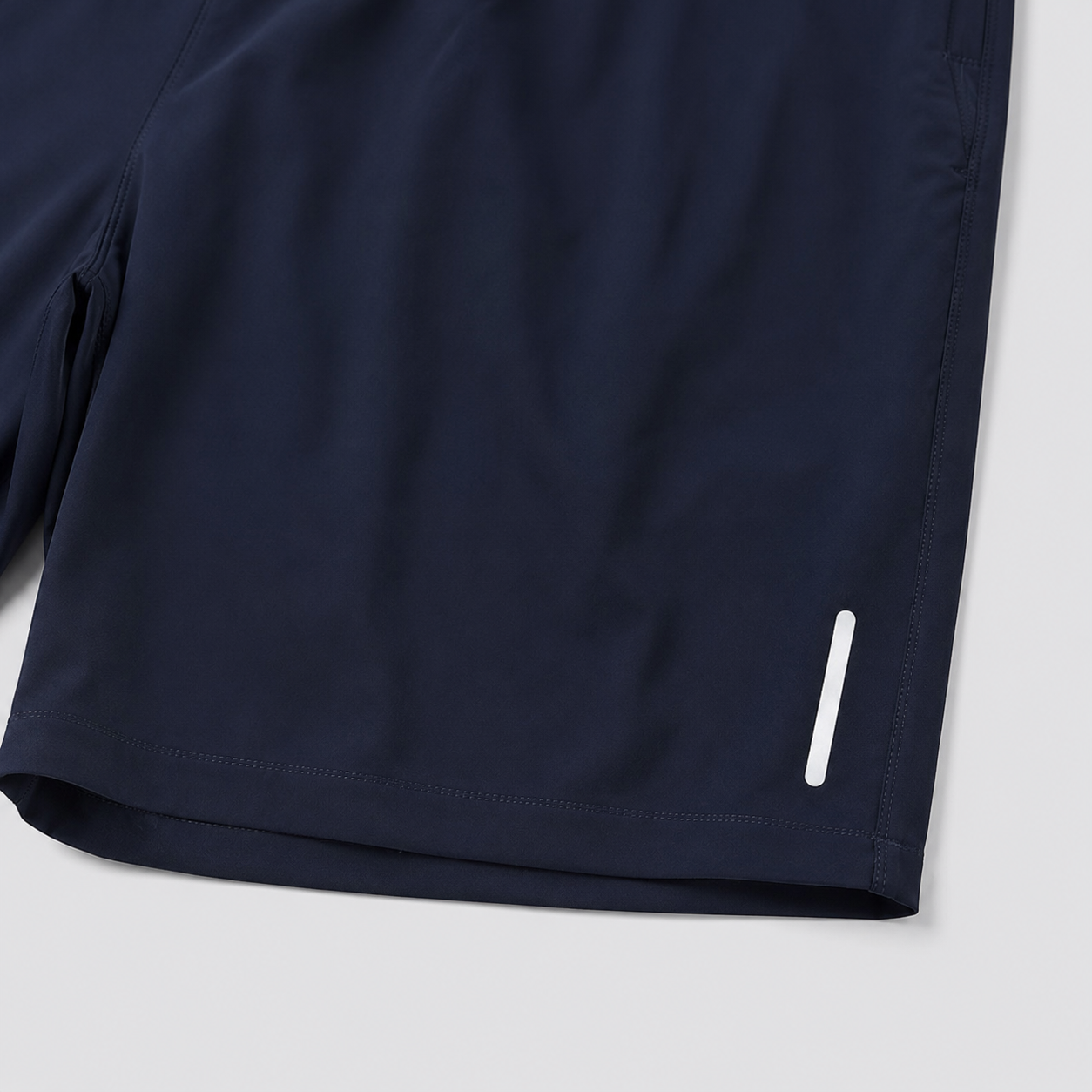 Men's zipper pocket shorts hem detail