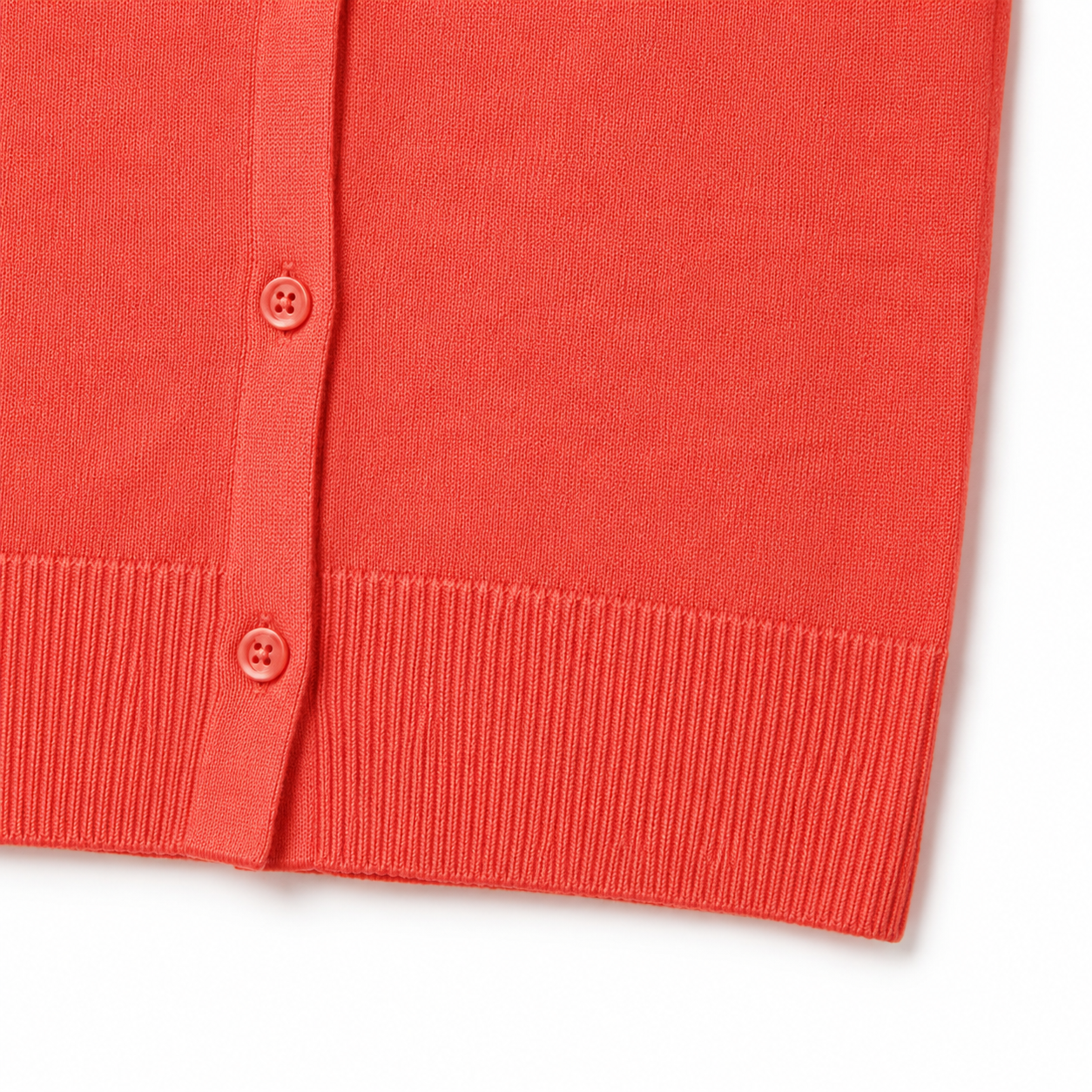 Button placket and ribbed hem detail