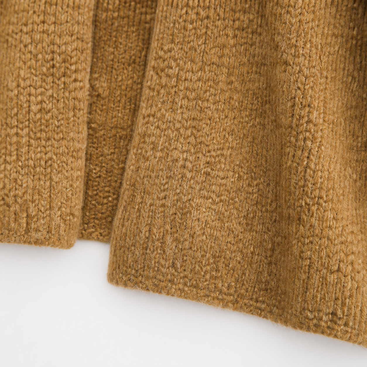 Women's cardigan knit hem detail