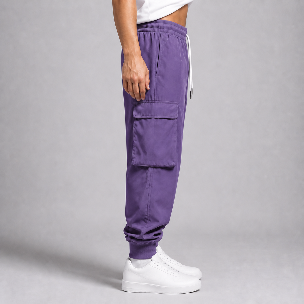 Side view showing the flap cargo pocket and rib cuff