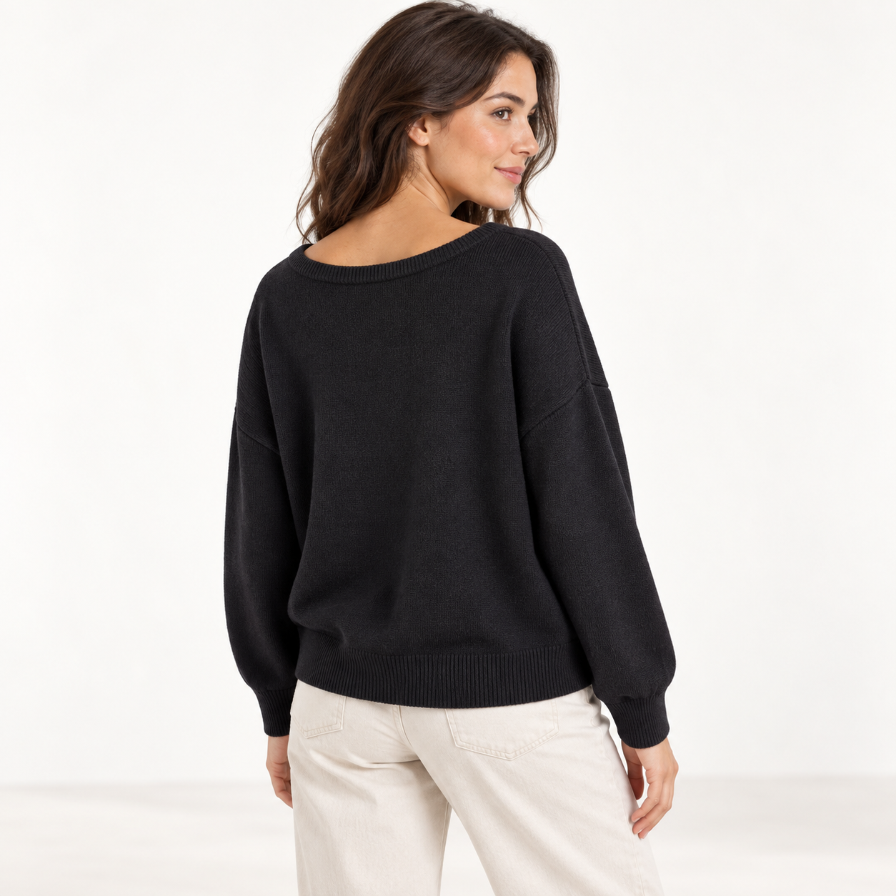 Side and back fit view of the relaxed women’s scoop-neck sweater