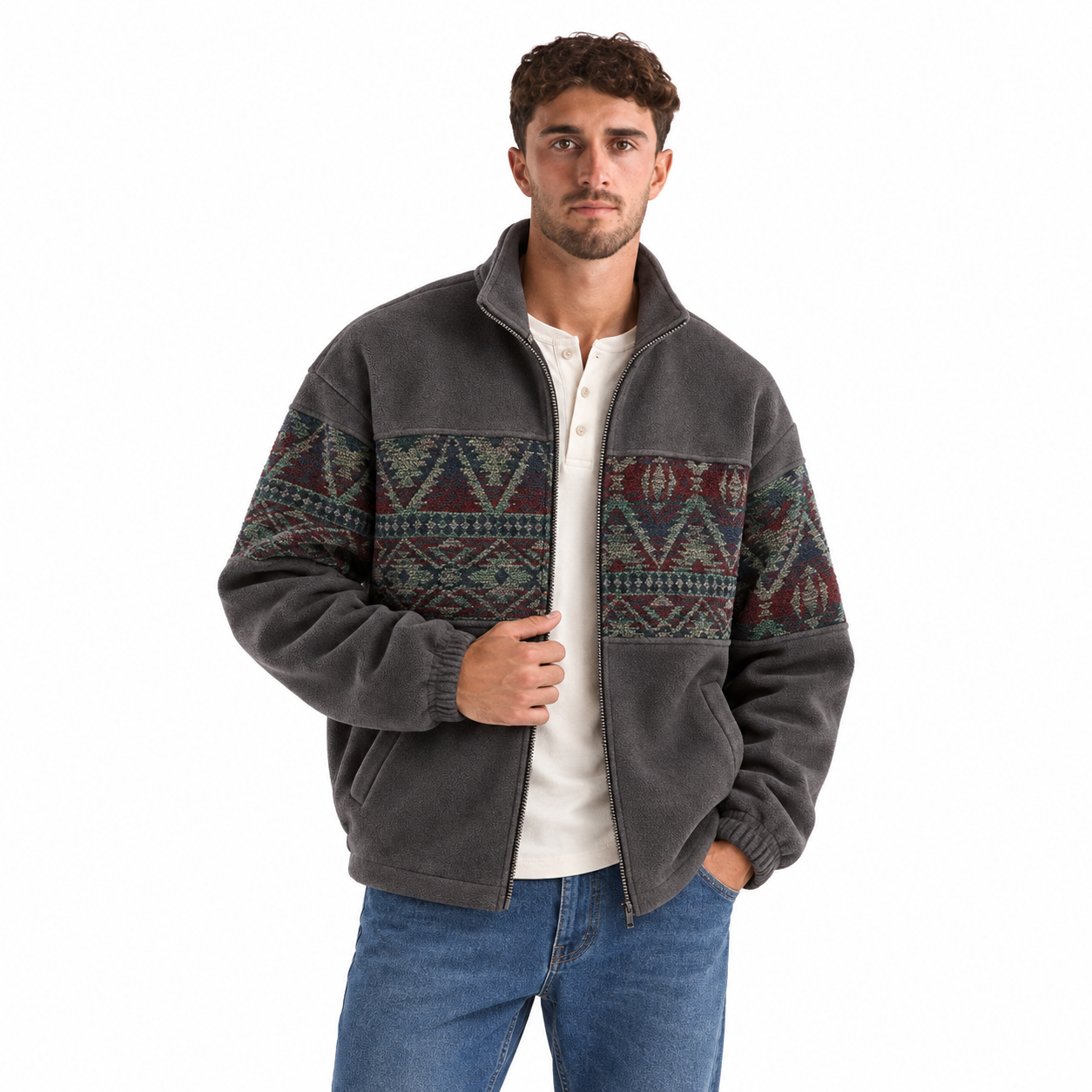 Charcoal ethnic-pattern fleece jacket modeled with classic denim