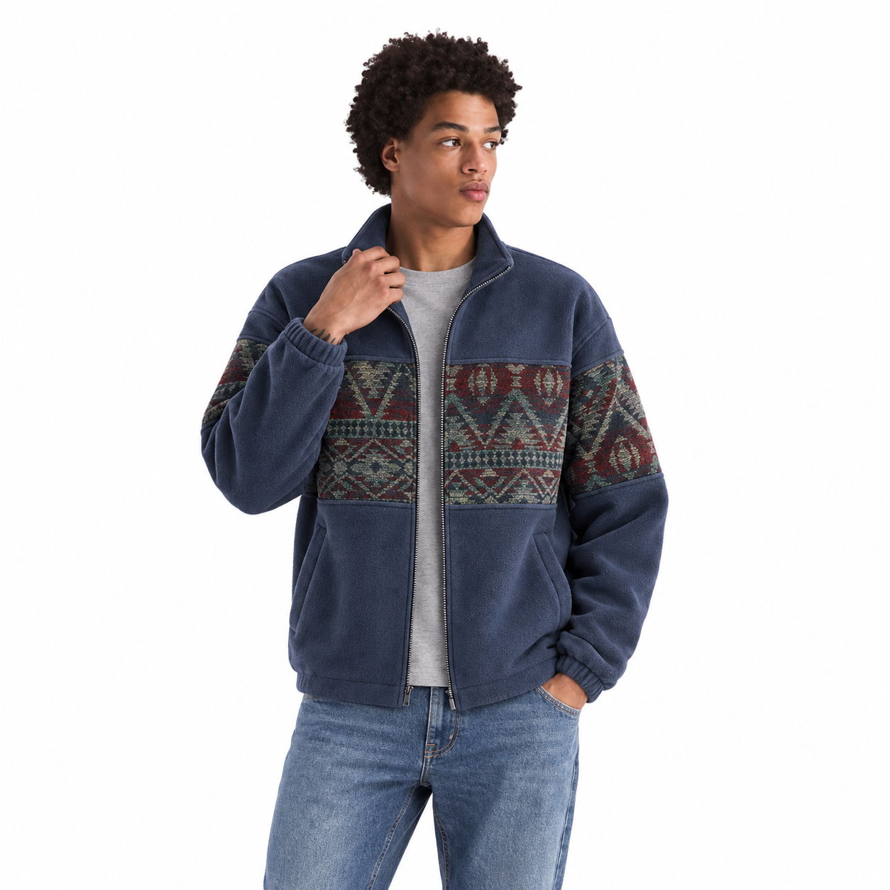 Muted Navy ethnic-pattern fleece jacket modeled with classic denim