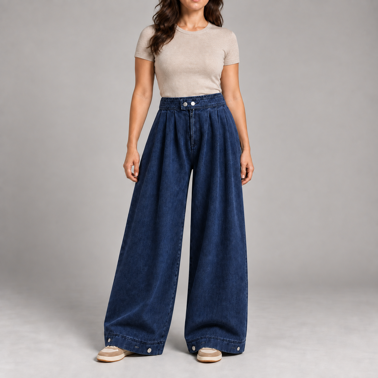 Woman wearing the Dark Blue pleated balloon jeans color option