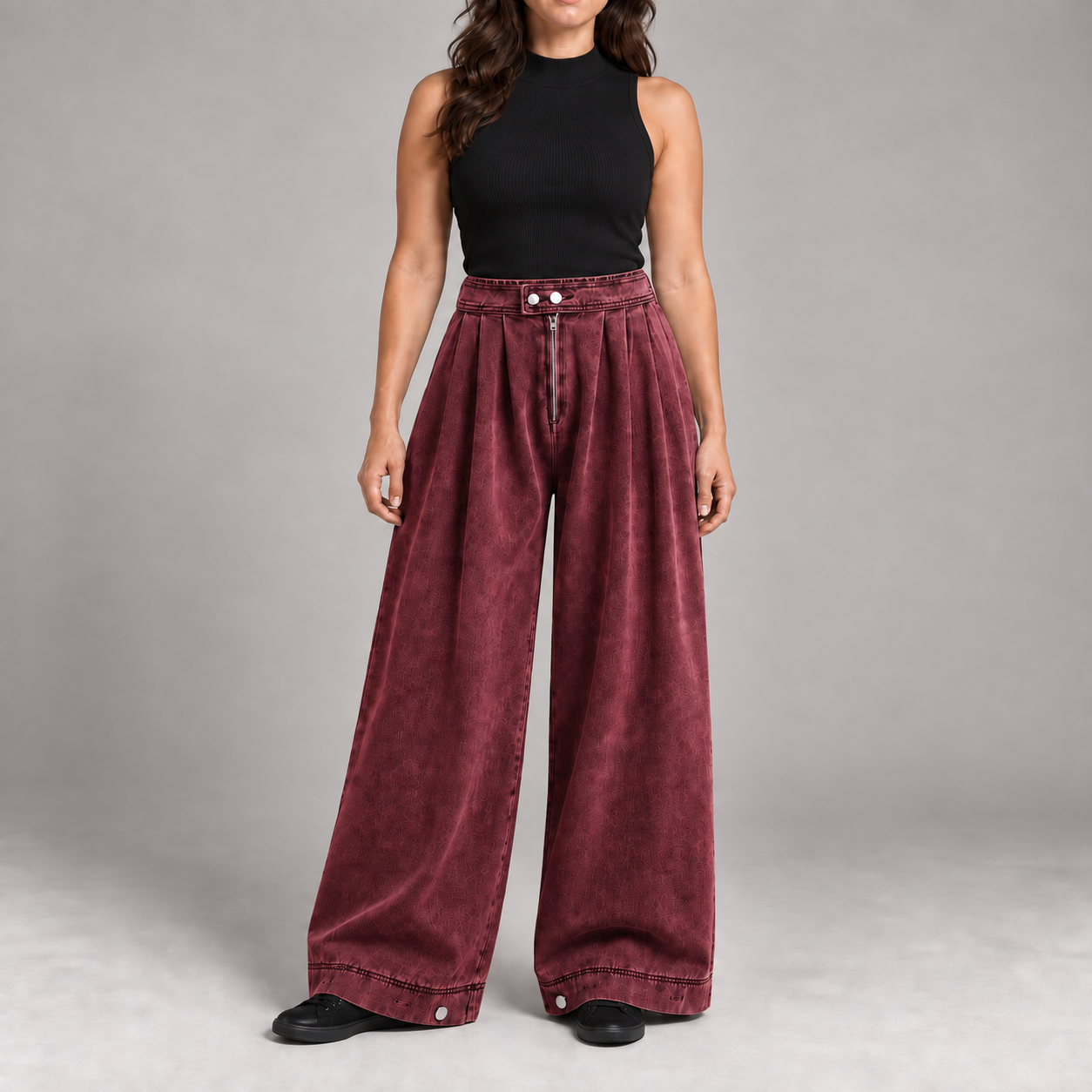 Woman wearing the Burgundy pleated balloon jeans color option