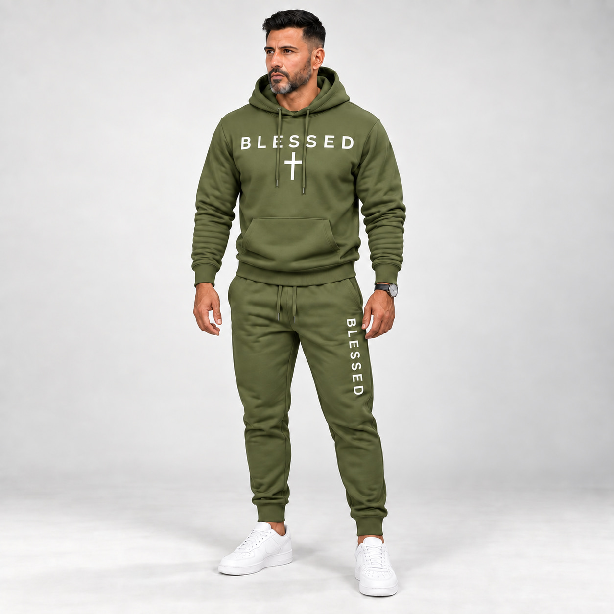 Adult male wearing the Army Green BLESSED hoodie and jogger set