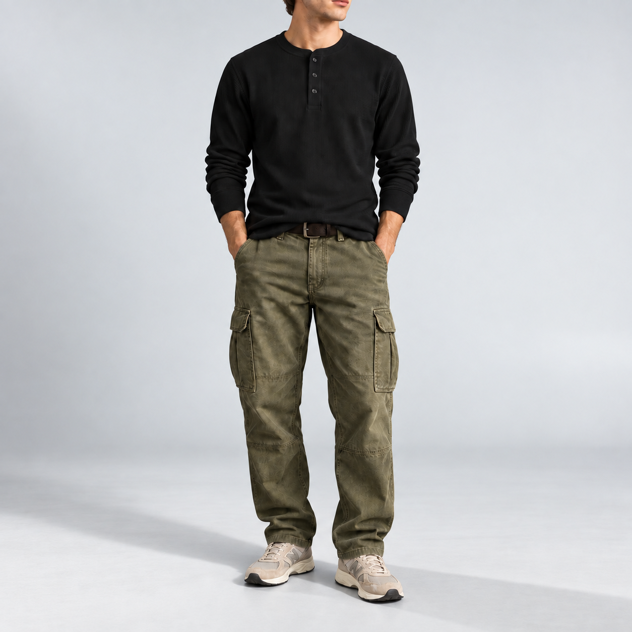 Black men's waffle-knit Henley front view with cargo pants