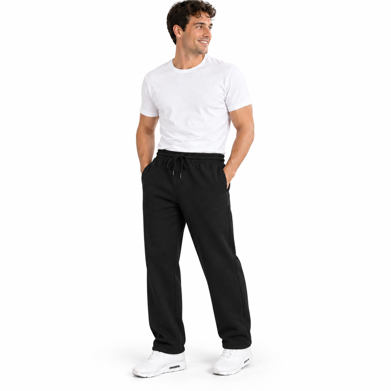 Male model front view wearing black heavyweight fleece open-bottom sweatpants