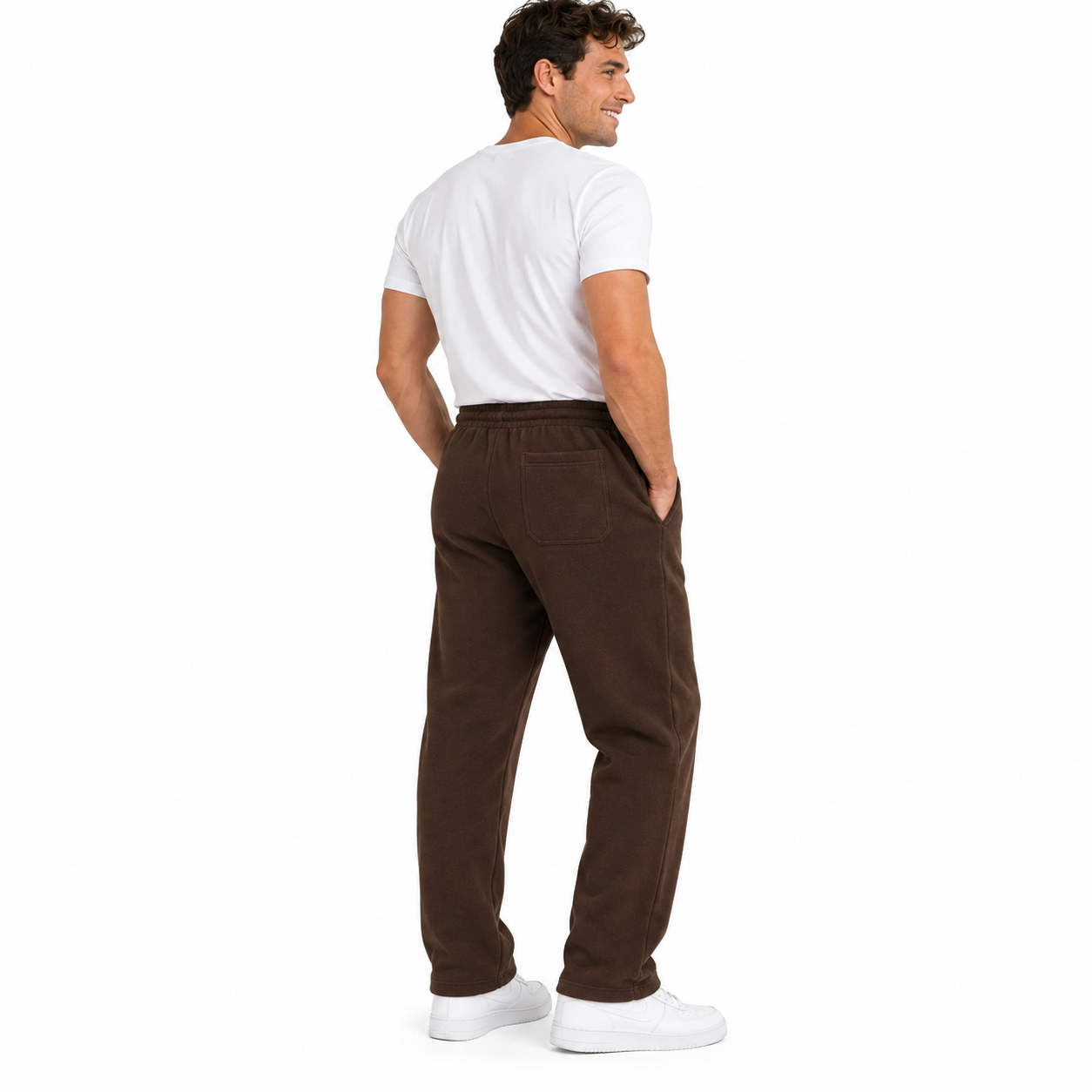 Male model rear three-quarter view wearing brown heavyweight fleece open-bottom sweatpants