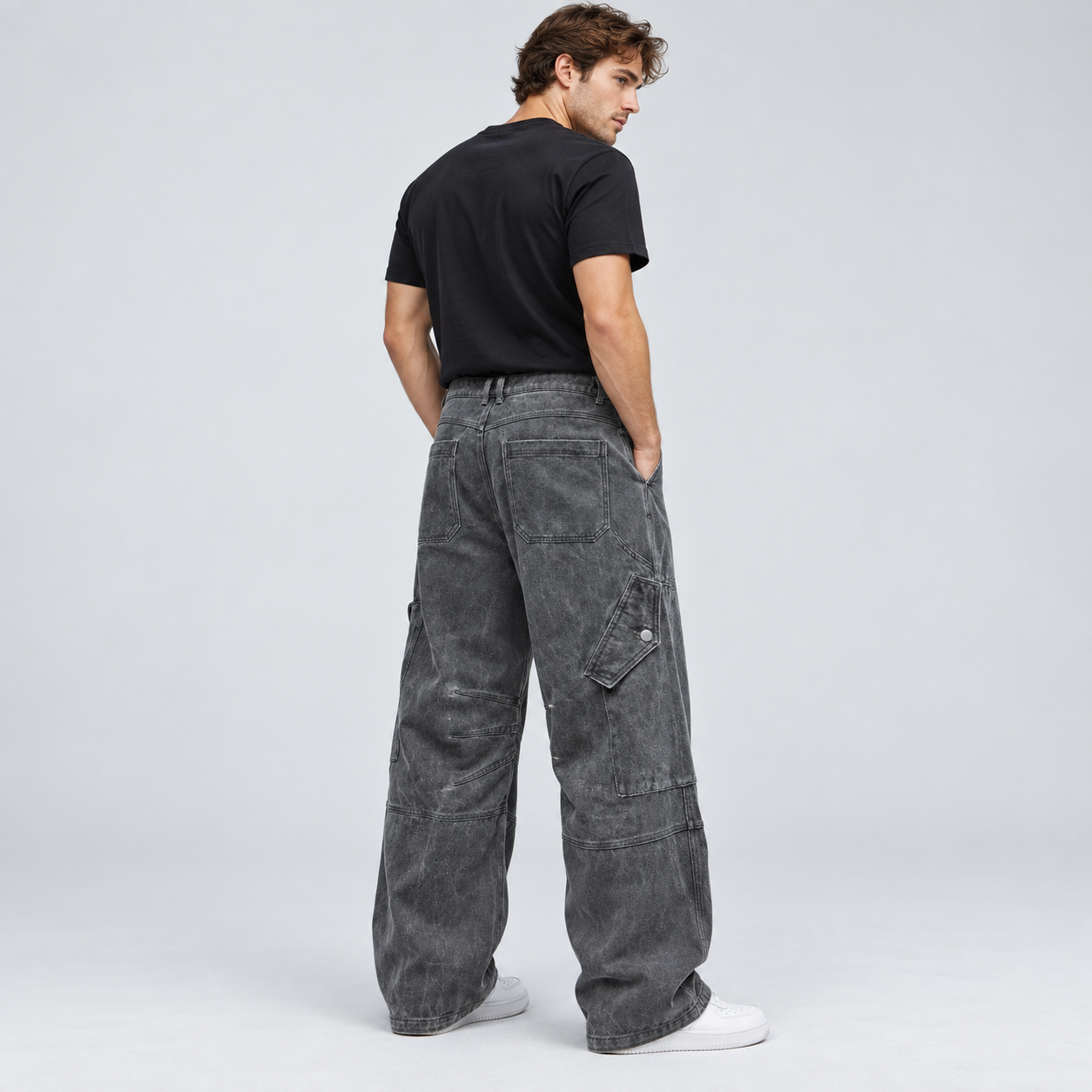 Side and back fit view of men's Grey overdyed baggy utility cargo pants