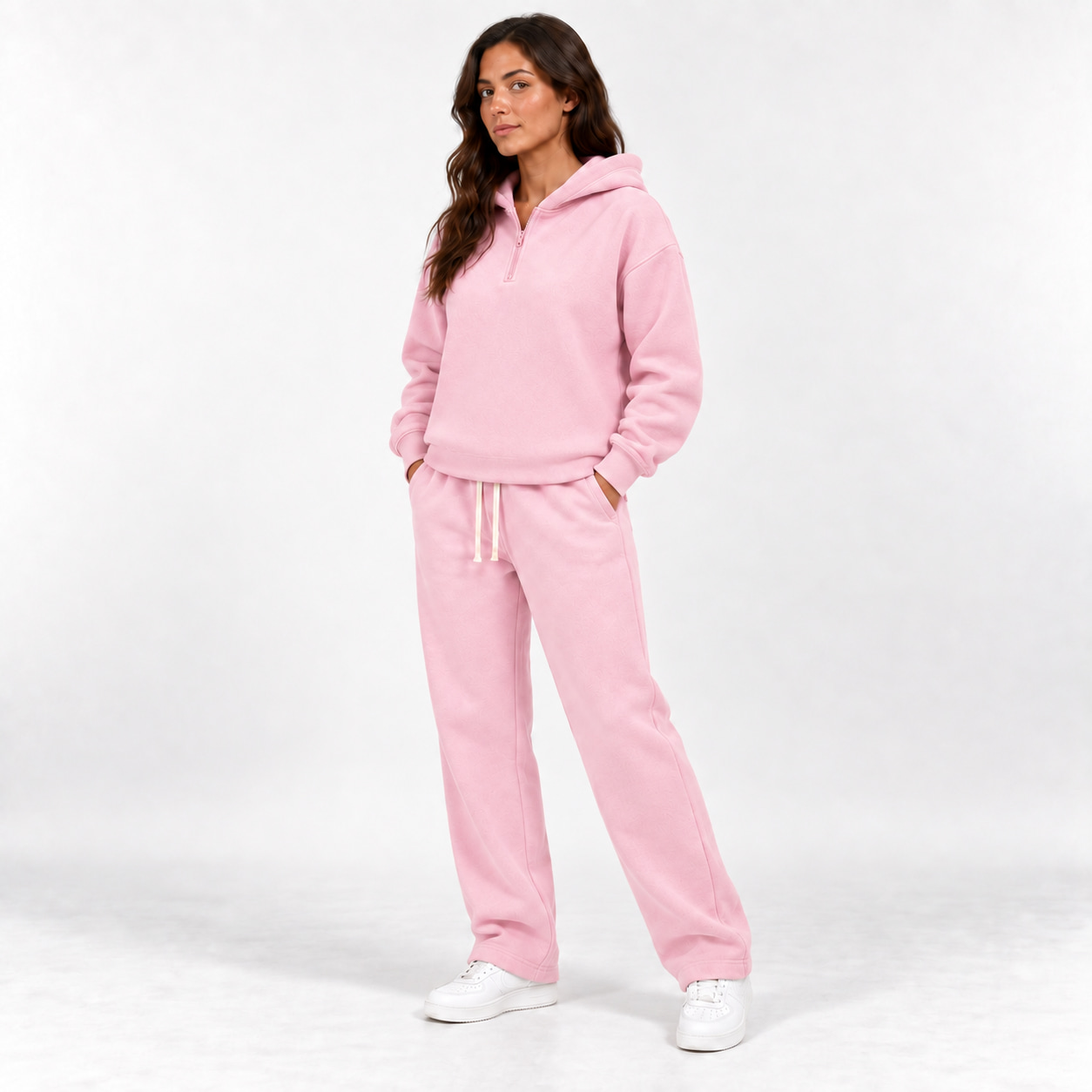 Baby Pink unisex half-zip hoodie and straight-leg sweatpants complete two-piece set