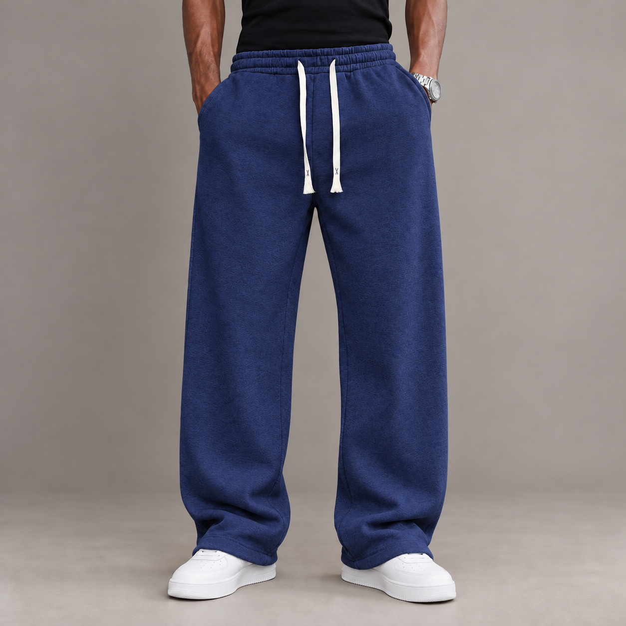 Adult male model wearing the Royal Blue unisex relaxed straight-leg casual pants