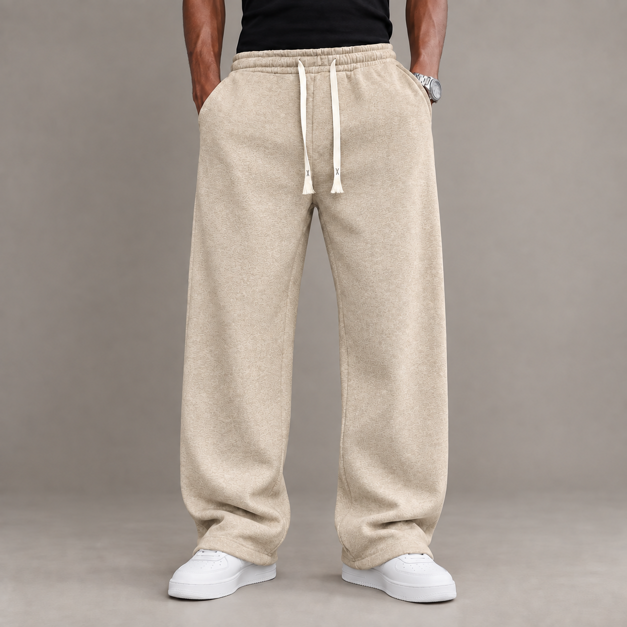 Adult male model wearing the Khaki unisex relaxed straight-leg casual pants