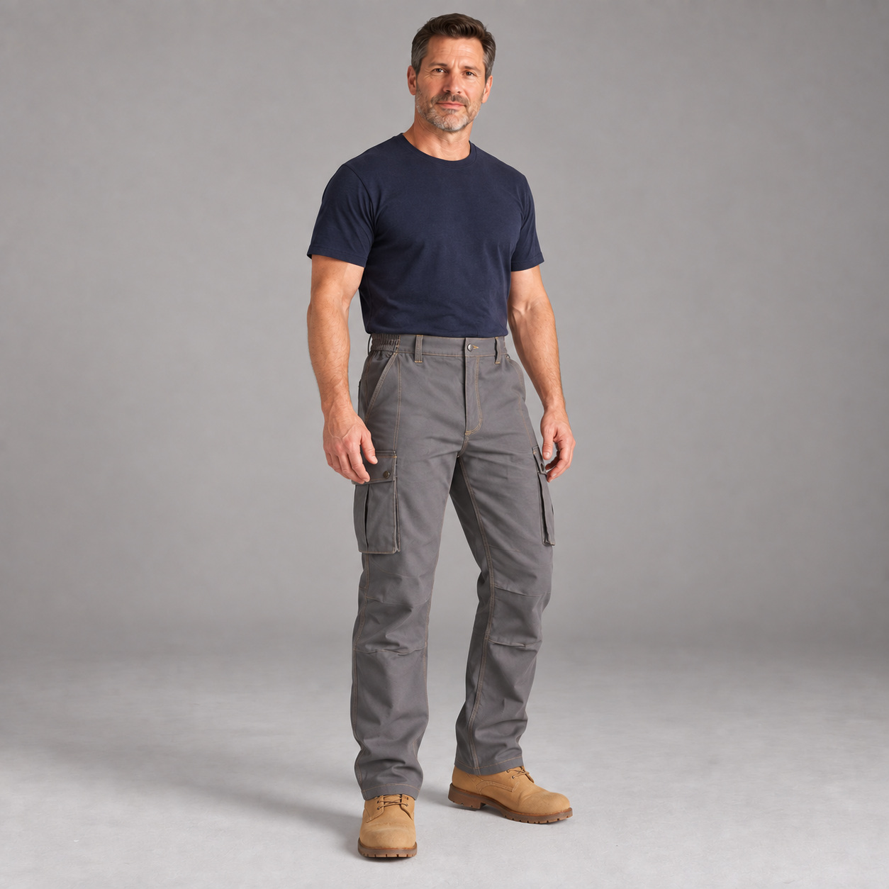 Adult male wearing Mid Grey stretch canvas cargo work pants