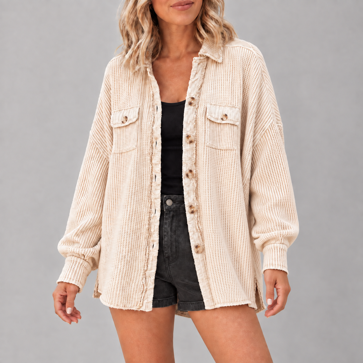 Adult woman wearing the Apricot waffle-knit button shacket