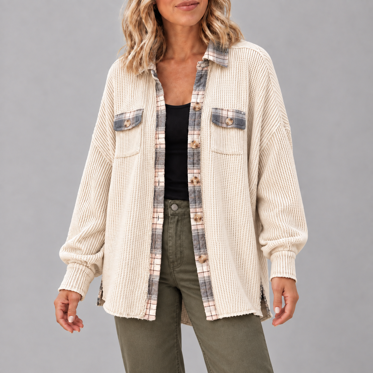 Adult woman wearing the Apricot Plaid waffle-knit button shacket