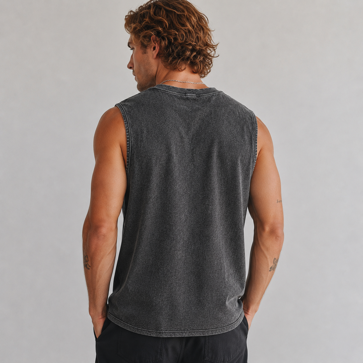 Back view of men's mineral-washed sleeveless tank top