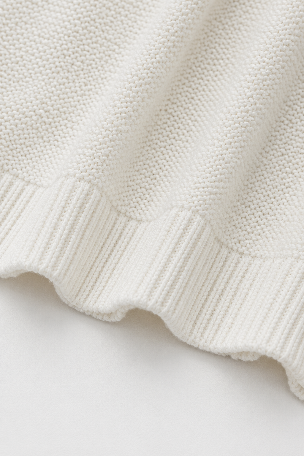 Soft open knit texture detail