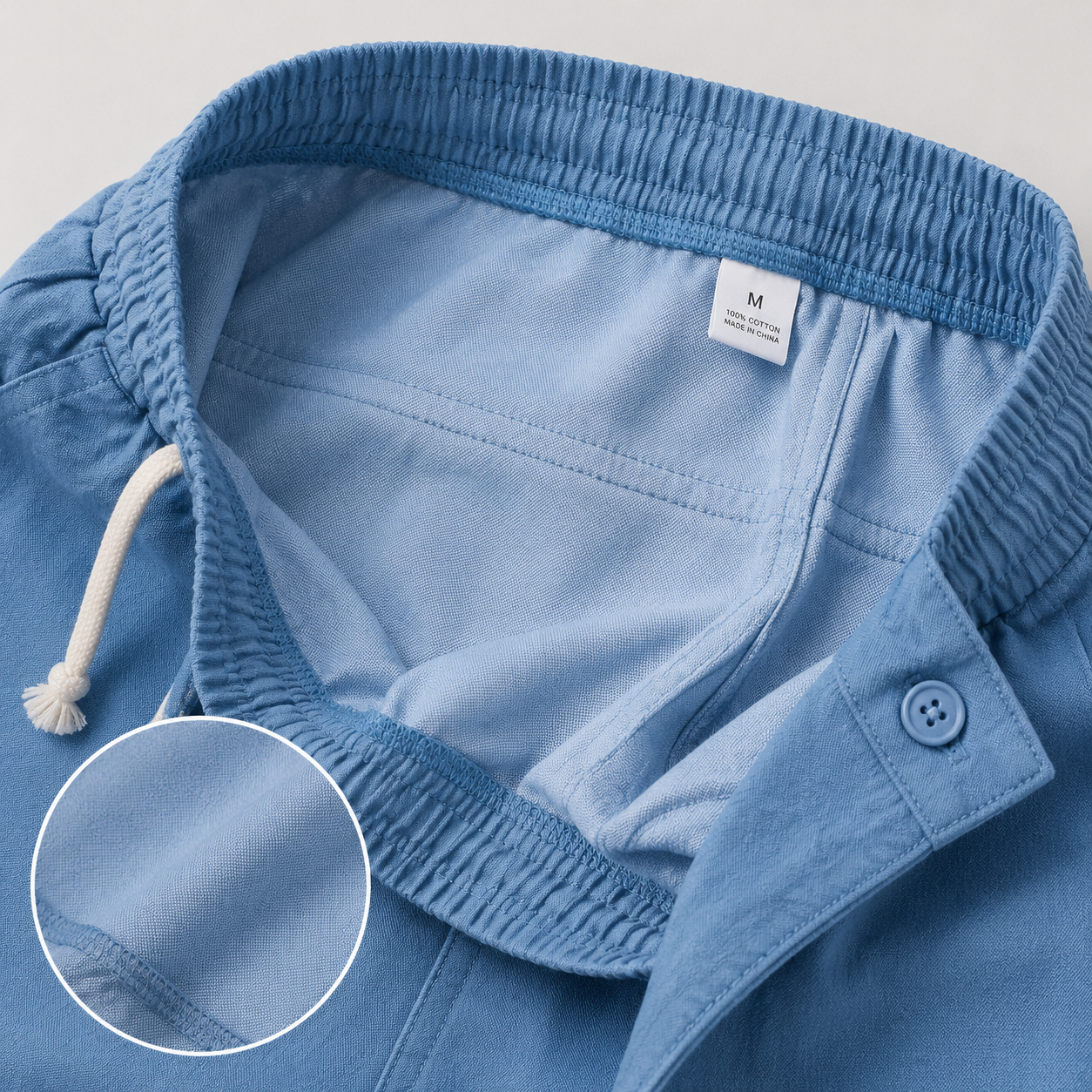 Elastic waistband inner seam and drawstring detail