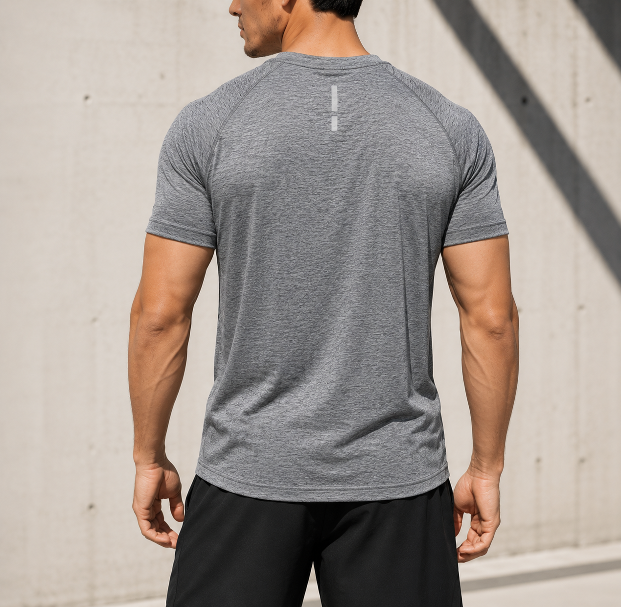 Graphite Heather back view performance tee