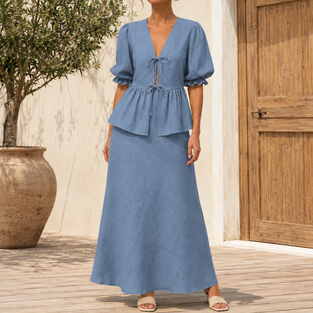 Dusty blue tie front puff sleeve top and maxi skirt on model